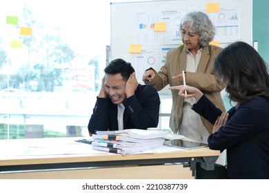 Stressed Annoyed Office Employee Having Headache Migraine At Business Finance Meeting