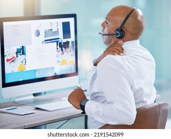 Stressed, Back Pain Call Center Agent Stretching Bad, Strained Or Sore Muscle While Working On Computer. Behind Of Tired Sales Rep Or Support Consultant Working Overtime Or Sitting Long Hours At