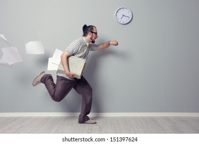 Stressed business man rushing in the office - Shutterstock ID 151397624