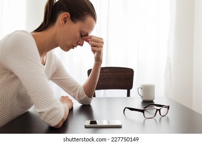 Stressed businesswoman - Powered by Shutterstock