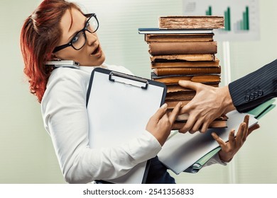 Stressed businesswoman overwhelmed by coworker's added tasks in busy office. Frustrated and anxious, surrounded by books and paperwork. Man holding phone, unaware of burden - Powered by Shutterstock