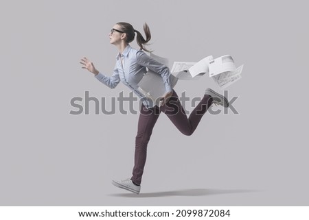 Stressed businesswoman running and losing her paperwork, deadlines concept