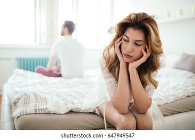 Stressed Couple Arguing And Having Marriage Problems