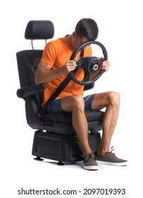 Stressed Man In Car Seat And With Steering Wheel On White Background