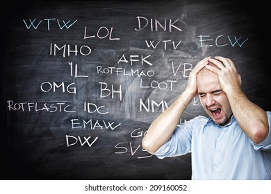 stressed man and internet slang on blackboard