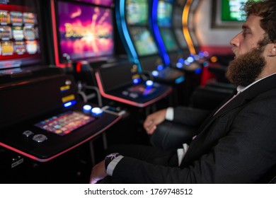 Stressed Man Losing Money In A Casino