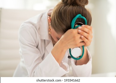 Stressed Medical Doctor Woman In Office