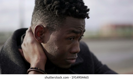 Stressed Ou Black African Man Feeling Neck Pain Due To Emotional Struggle