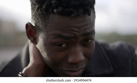 Stressed Ou Black African Man Feeling Neck Pain Due To Emotional Struggle