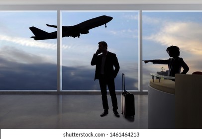 Stressed Out Businessman Passenger Arguing With A Flight Attendant Or Receptionist At An Airport Check In Counter.  He Is Angry Because Of A Delayed Or Cancelled Flight.  