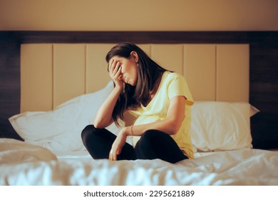 
Stressed Pregnant Woman Making Facepalm Gesture Resting in Bed. Girl feeling desperate and unhappy during her pregnancy
 - Shutterstock ID 2295621889