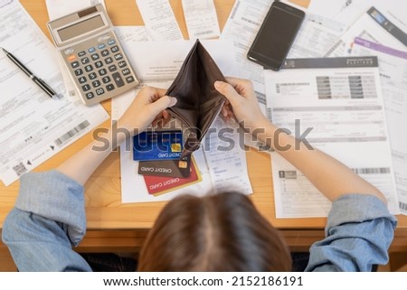 Stressed, Problem business person woman holding and open empty wallet, purse no have money for bill payment, credit card loan or expense. Bankruptcy, bankrupt or debt financial, mortgage concept.