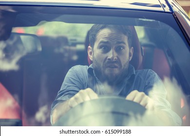 Stressed Scared Young Man Driver. Inexperienced Anxious Motorist Concept 