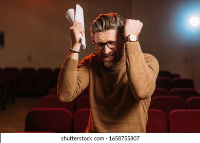 Stressed Stage Director With Scenario On Rehearse In Theater