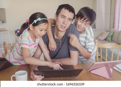 stressed and tired parent working from home with children. Homeschooling, stay home, lockdown, social distancing during covid-19 lockdown isolation, freelance job, new normal concept