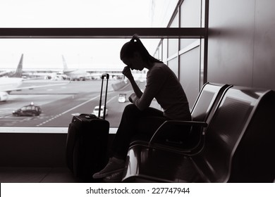 Stressed woman at the airport
