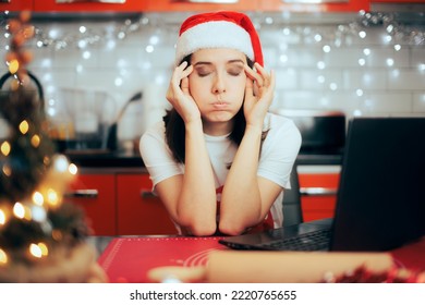 
Stressed Woman Checking Her Laptop For An Online Video Recipe. Tired Working Person Planning A Christmas Party At Home 
