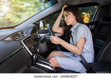 Stressed Woman Driver Sitting Inside A Car