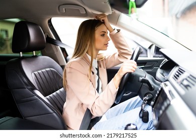 Stressed Woman Driver Sitting Inside Her Car