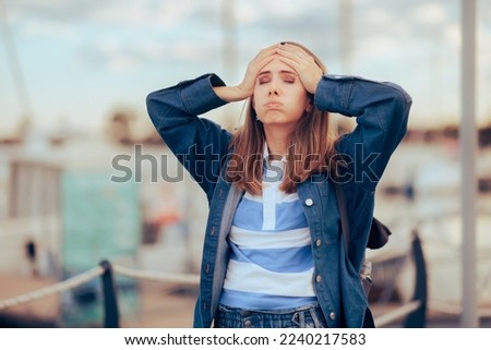
Stressed Woman Having a Bad Time During her Vacation. Exasperated tourist feeling lost and unhappy
