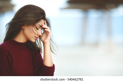 Stressed Woman with Headache on the Beach. Outdoor Sad Woman - Shutterstock ID 540462781