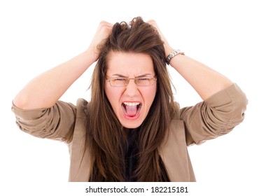 stressed woman pulling her hair in frustration and screaming