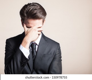 Stressed young business man - Powered by Shutterstock