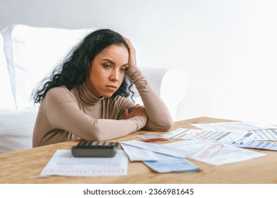 Stressed young woman has financial problems with credit card debt to pay crucial show concept of bad personal money and mortgage pay management crisis. - Shutterstock ID 2366981645