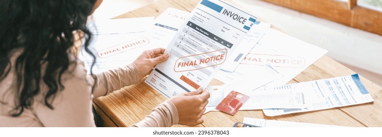 Stressed young woman has financial problems with credit card debt to pay crucial show concept of bad personal money and mortgage pay management crisis. - Shutterstock ID 2396378043