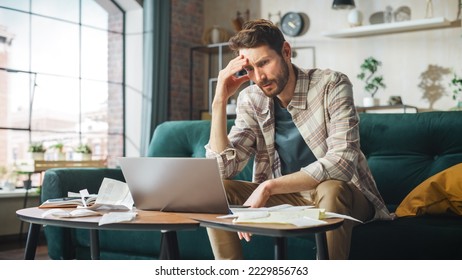 Stressful Accounting at Home: Man Using Laptop, Filling Tax Forms. Worried Male Has Paperwork Problems with Bills and Invoices. Budget Deficit, High Inflation, Financial Difficulty, Debt, Bankruptcy