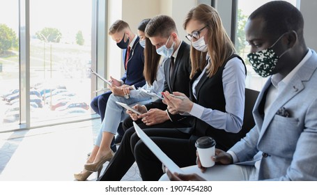 Stressful Business People Waiting For Job Interview With Face Mask, Social Distancing Quarantine During COVID19 Affect