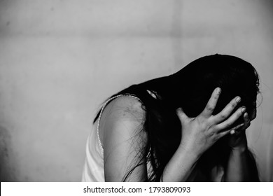 Stressful And Hopeless Woman Sitting On Ground, Abuse Concept