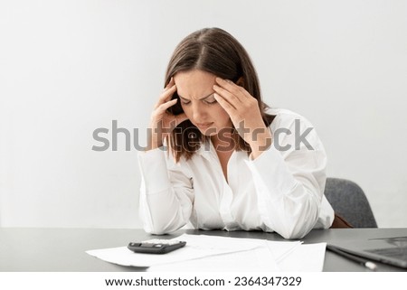 Stressful Job. Stressed Businesswoman At Laptop Touching Head Having Headache Problem At Workplace, Sitting At Table In Modern Office Interior. Entrepreneurship Crisis And Business Issues Concept