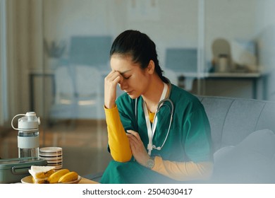 Stressing Medical Professional Taking Break at Work - Powered by Shutterstock