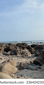 stretch of beach with rocks