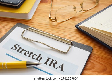 Stretch IRA Form With Pen In The Office.