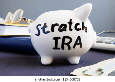 Stretch Ira Written On A Piggy Bank. Retirement.