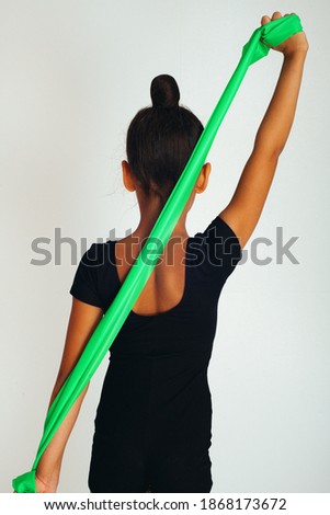 The stretch ribbon is green and bright