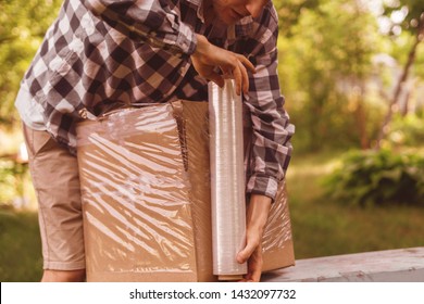 Stretch Wrap Roll, Man Packing The Box For Shipping