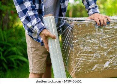 Stretch Wrap Roll, Man Packing The Box For Shipping