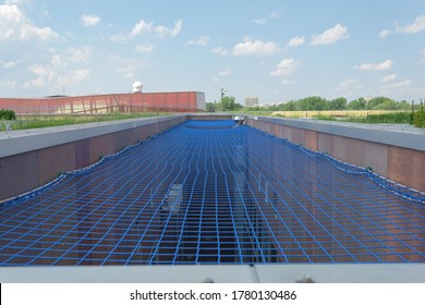 Stretched mesh to prevent falling down. Safety net between houses. - Shutterstock ID 1780130486