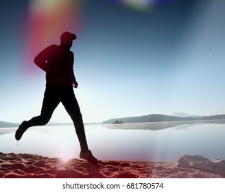 Stretching After Jogging. Middle Age Sports Man Do Stretching Pose And Deep Breath. Outdoor Training At Offshore, People And Lifestyle Concept.