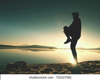 Stretching After Jogging. Middle Age Sports Man Do Stretching Pose And Deep Breath. Outdoor Training At Offshore, People And Lifestyle Concept.