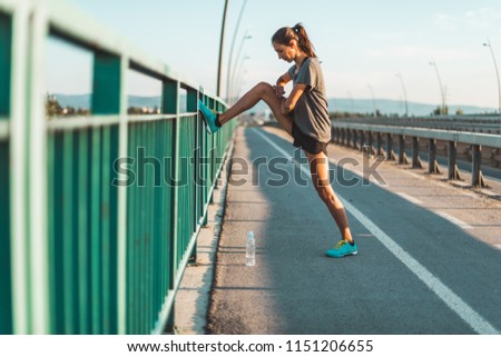 Similar – Happy fit woman taking a break from jogging