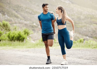 Stretching legs, warmup and couple of friends in the mountain for outdoor exercise. Training, wellness balance and young people smile with leg stretch for fitness run, sports and workout on a road - Powered by Shutterstock