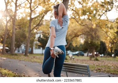 Stretching, park and legs of senior woman for running, training and workout with outdoor wellness, body goals and motivation. Warm up, healthy and fitness sports runner on path in nature for cardio