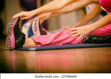 Stretching Pilate Exercises In Fitness Studio