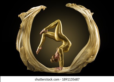 Stretching Woman Performance in golden flying Fabric. Yoga Pose exercising. Art Textile Circle Shape over Black Background