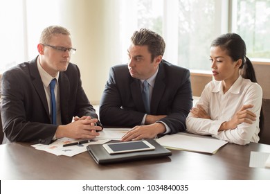 Strict Business Owner Meeting with Employees - Shutterstock ID 1034840035