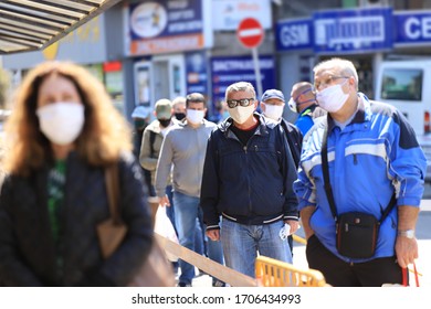 With Strict Control And Disinfection People, Wearing Face Masks For Prevention Of Coronavirus COVID-19 Disease, In A Line For Entry In A Marketplace In Sofia, Bulgaria On 04/14/2020.